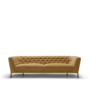 mustard yellow button sofa with metal legs